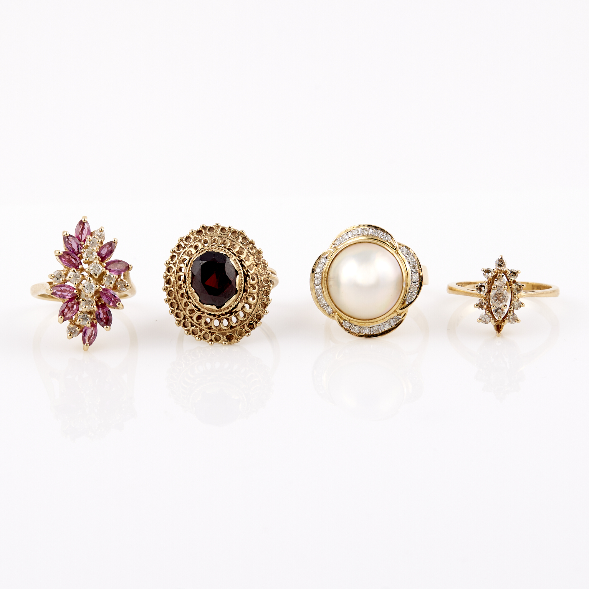 Lot image - Three Diamond, Stone and Bead Rings and Gold and Stone Ring, 14K 14 dwt. all, stone missing