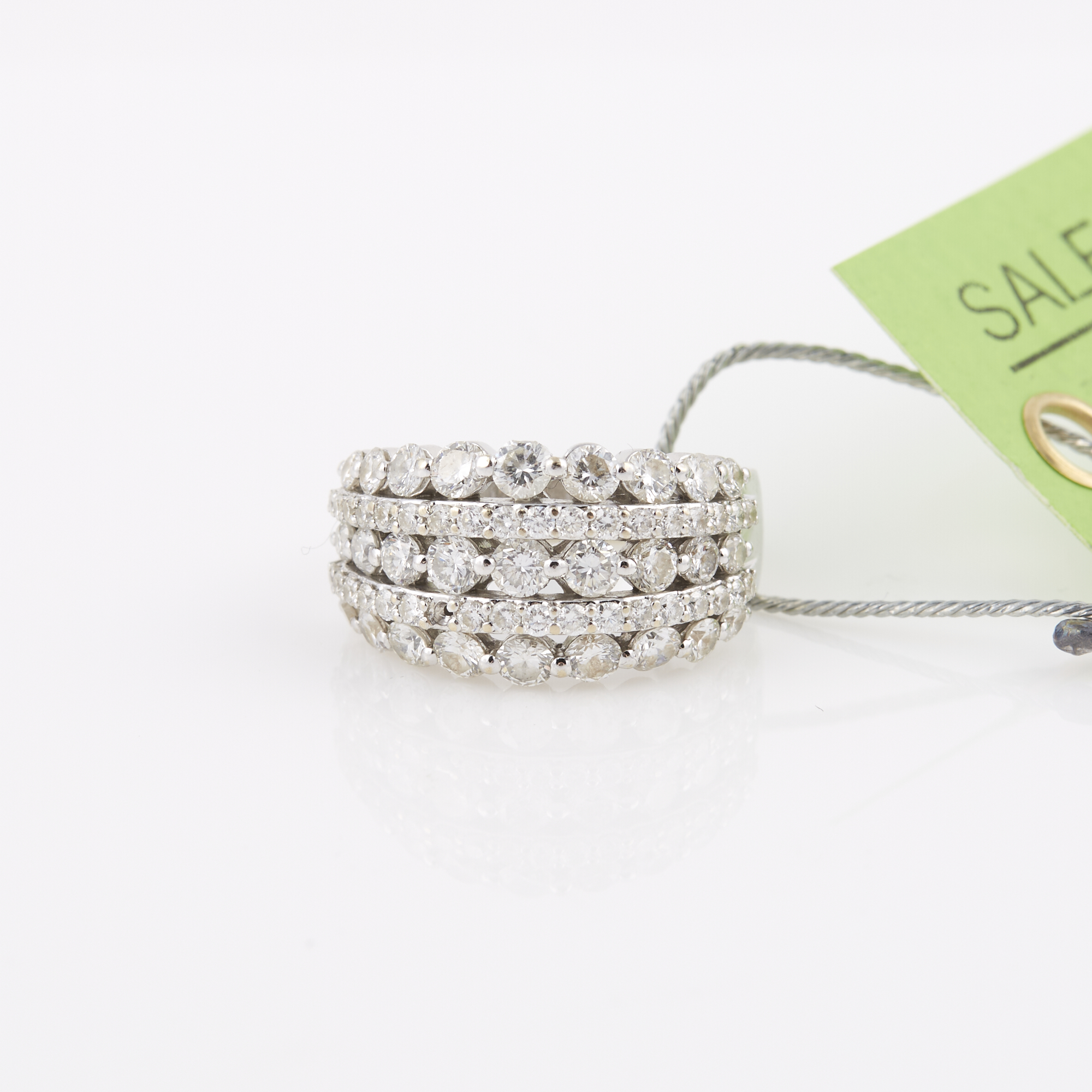 Lot image - Diamond Ring, 62 diamonds about 1.75 cts., 18K 6 dwt., stone missing