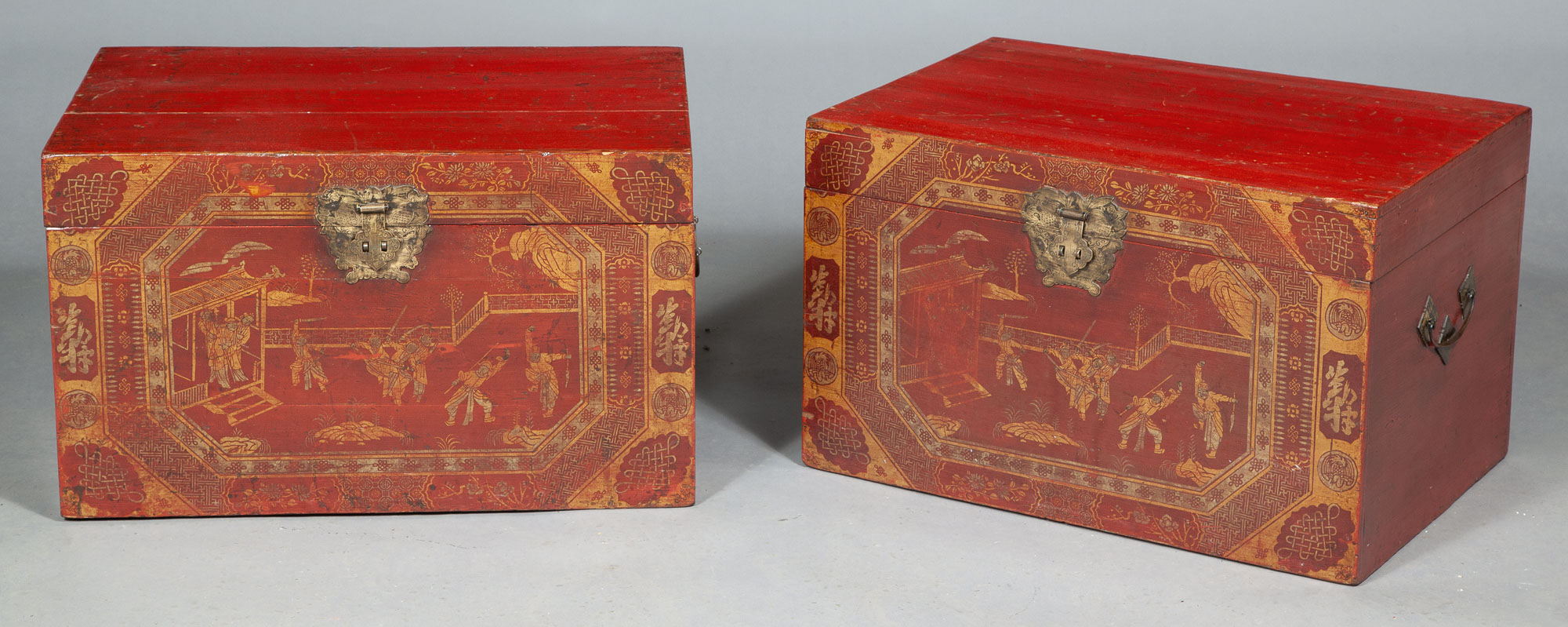 Lot image - Pair of Asian Red-Japanned and Parcel-Gilt Brass-Mounted Chests