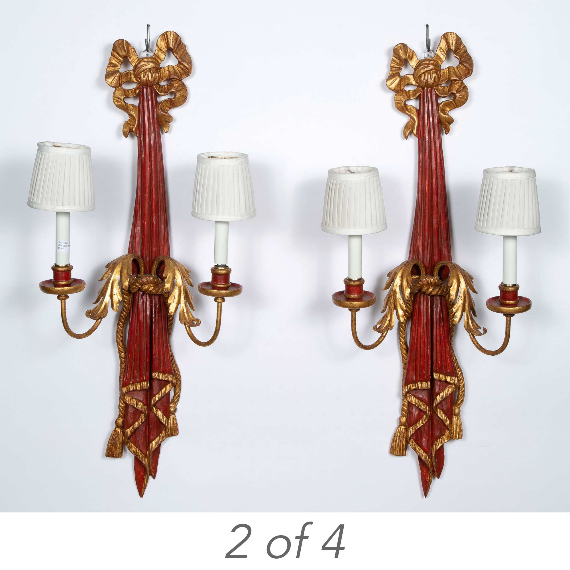 Lot image - Set of Four Painted and Parcel-Gilt Two-Light Wall Lights