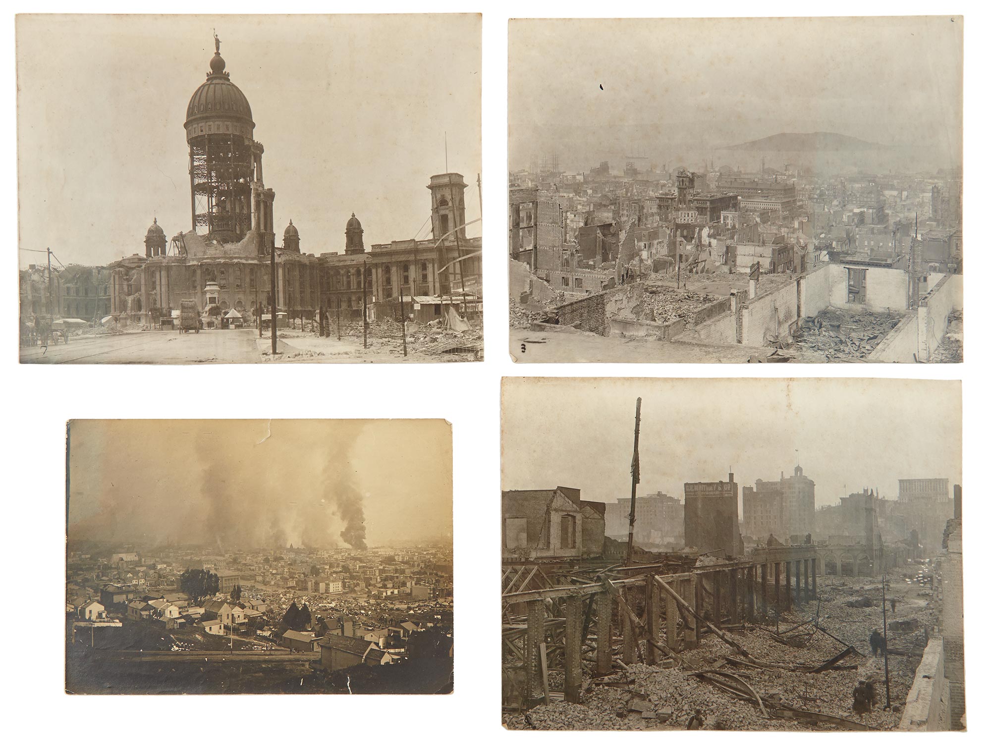 Lot image - [SAN FRANCISCO EARTHQUAKE]  Group of 20 photographs of the aftermath of the 1906 San Francisco earthquake and the resulting fire.
