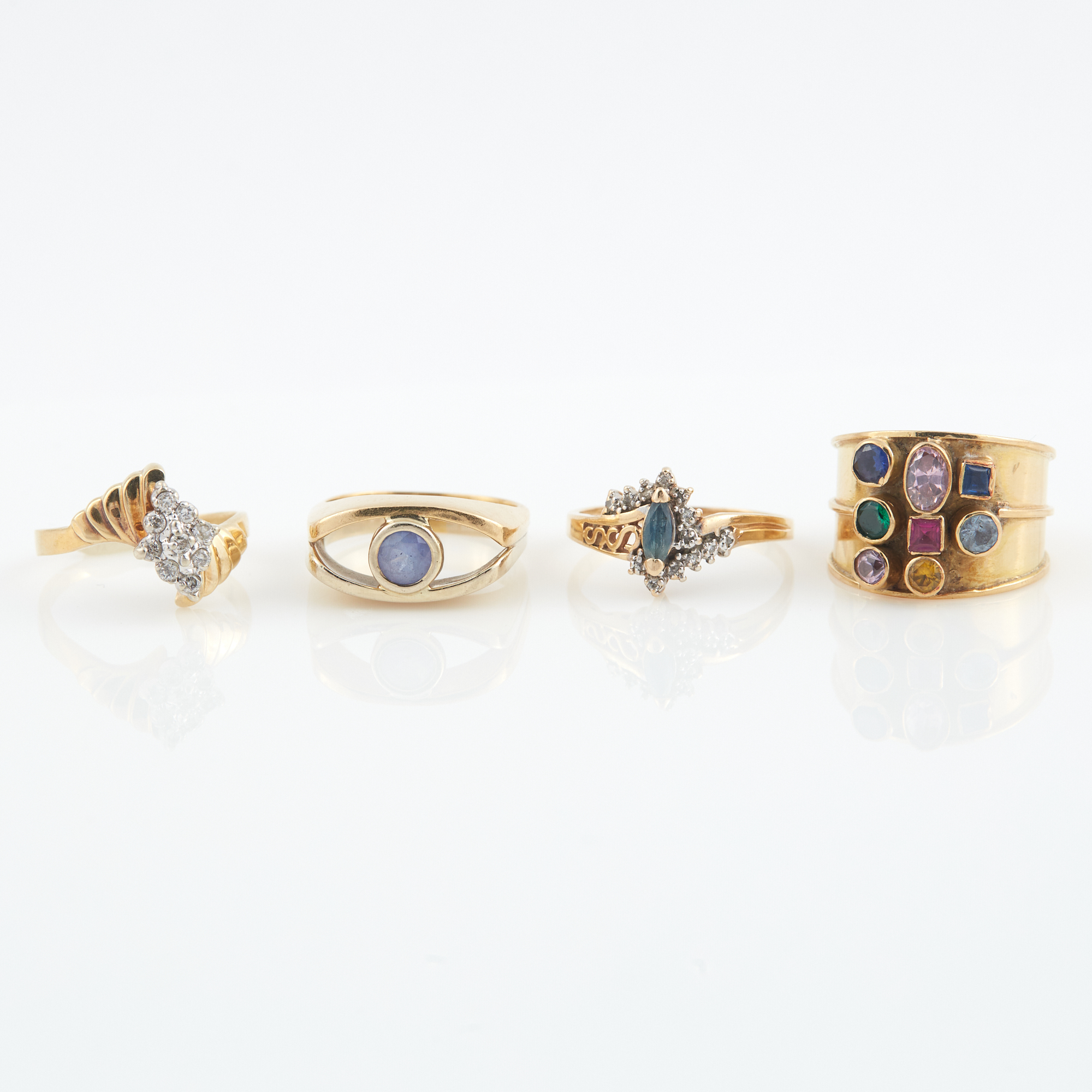 Lot image - Two Diamond and Stone Rings and Two Gold and Stone Rings, 18K 6 dwt. and 14K 10 dwt. all