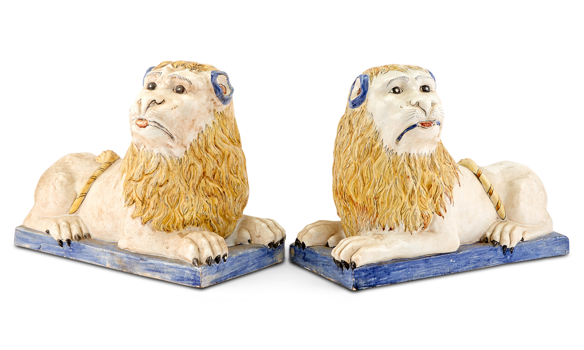 Lot image - Pair of Bavent Faience Figures of Recumbent Lions