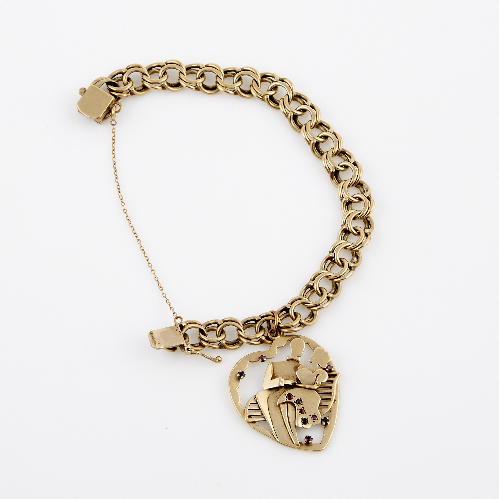 Lot image - Gold Charm Bracelet with gold and stone charm attached, 14K 28 dwt. all