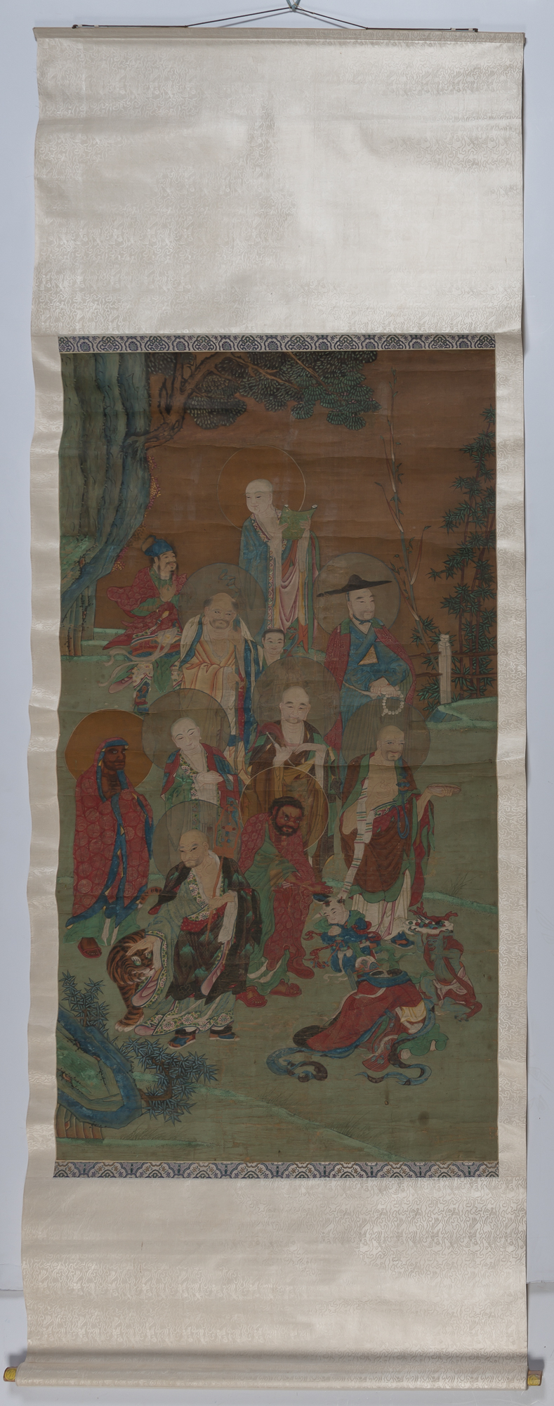 Lot image - A Large Chinese School Ink and Color Painting of an Assemblage of Luohan