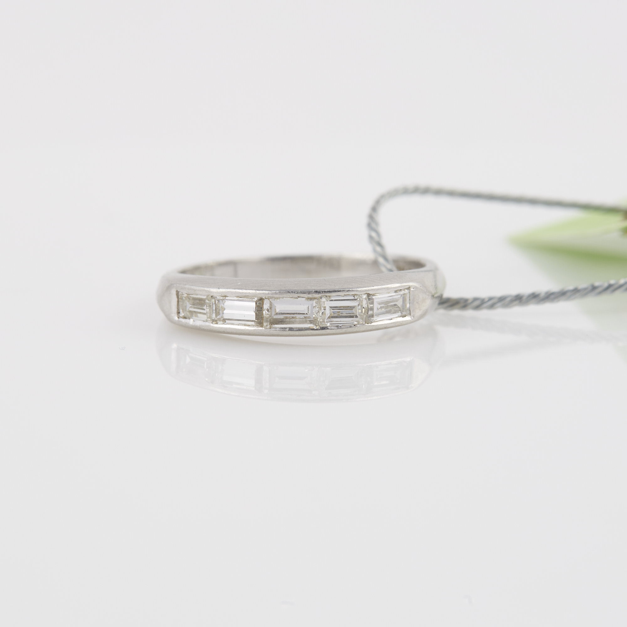 Lot image - Diamond Wedding Ring, 5 diamonds about 0.40 ct., Platinum 2 dwt.