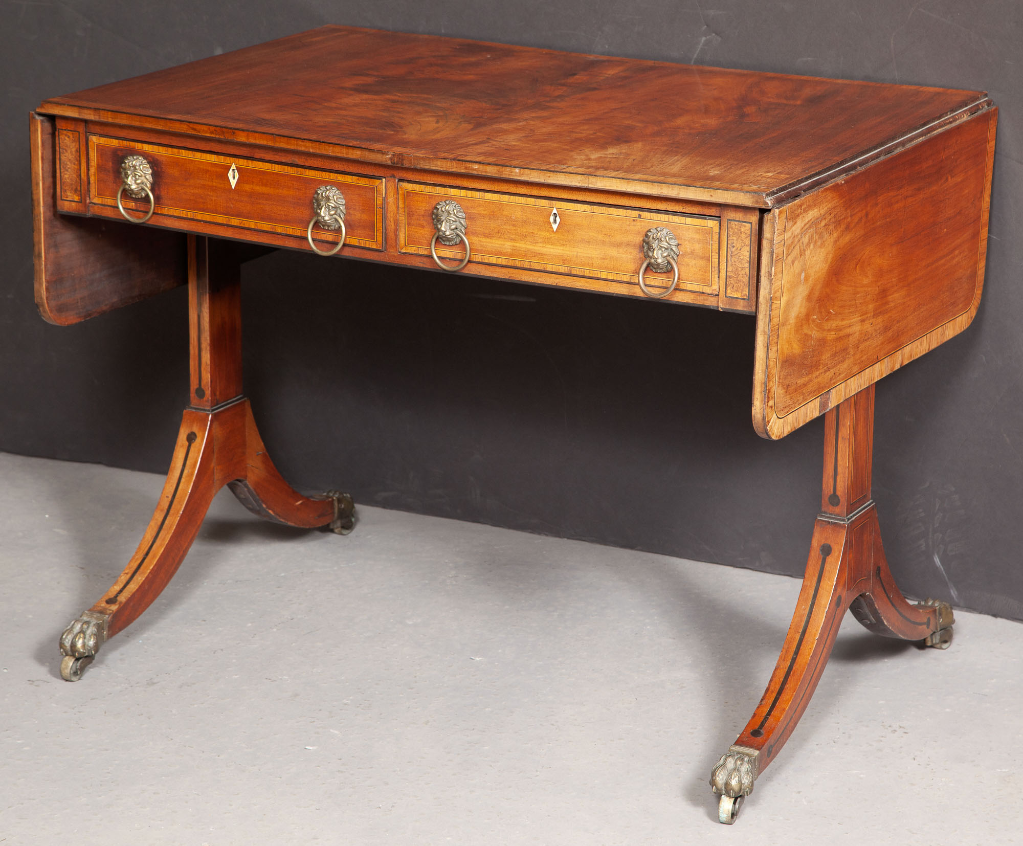 Lot image - Regency Ebony-Inlaid Mahogany Sofa Table