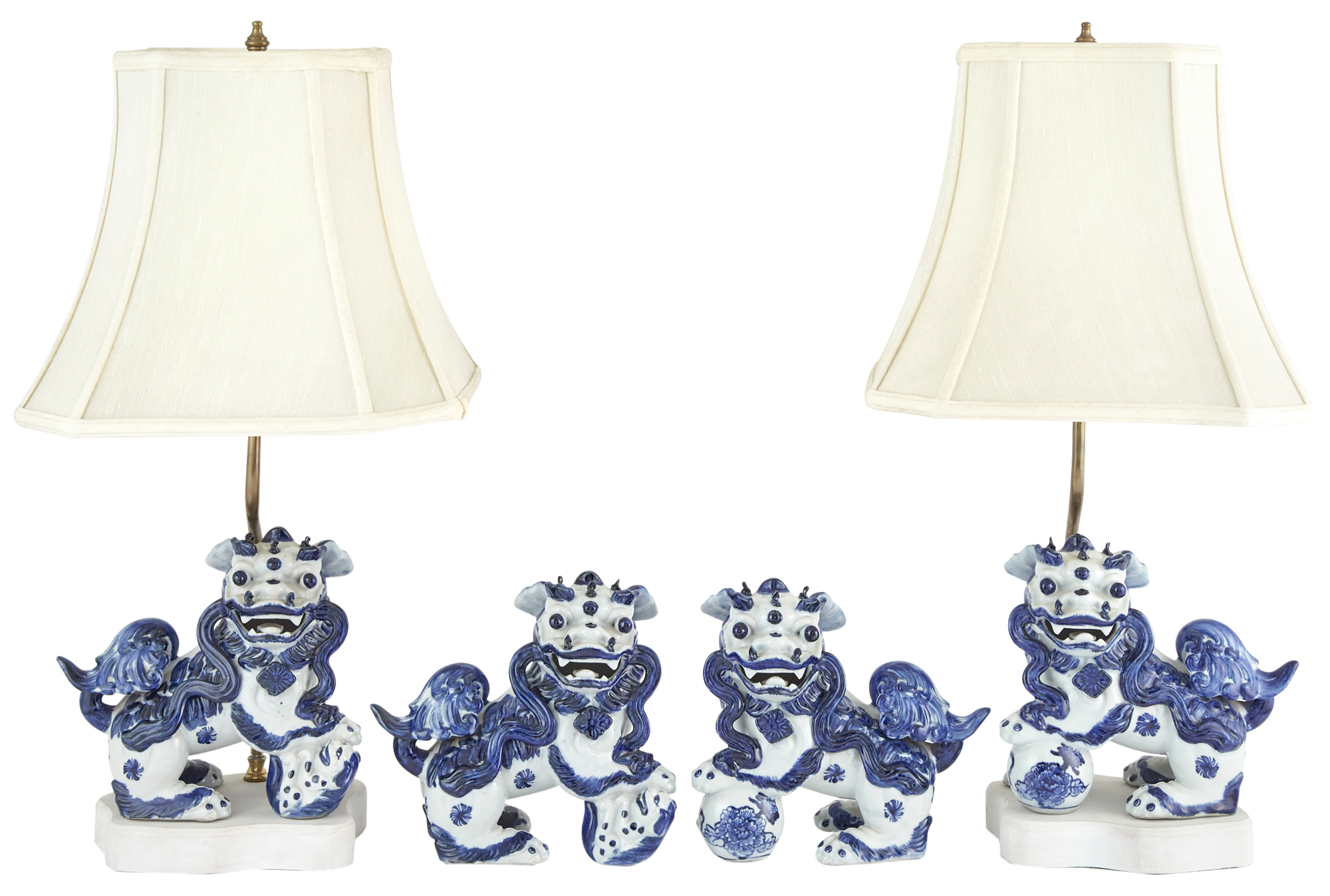 Lot image - Set of Four Blue and White Decorated Ceramic Fu Dogs