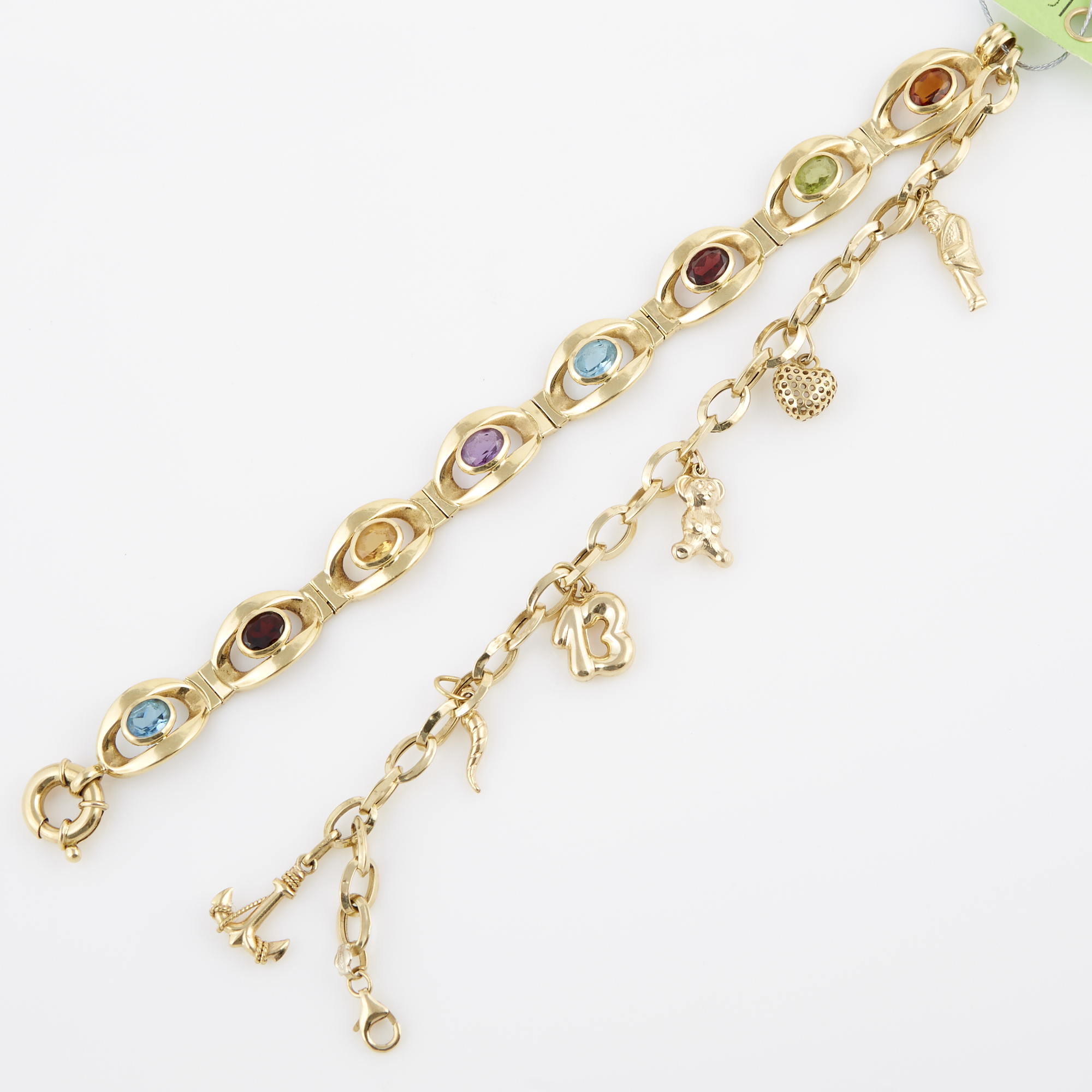 Lot image - Two Gold and Stone Flexible Bracelets with 6 gold charms attached, 18K 18 dwt. all