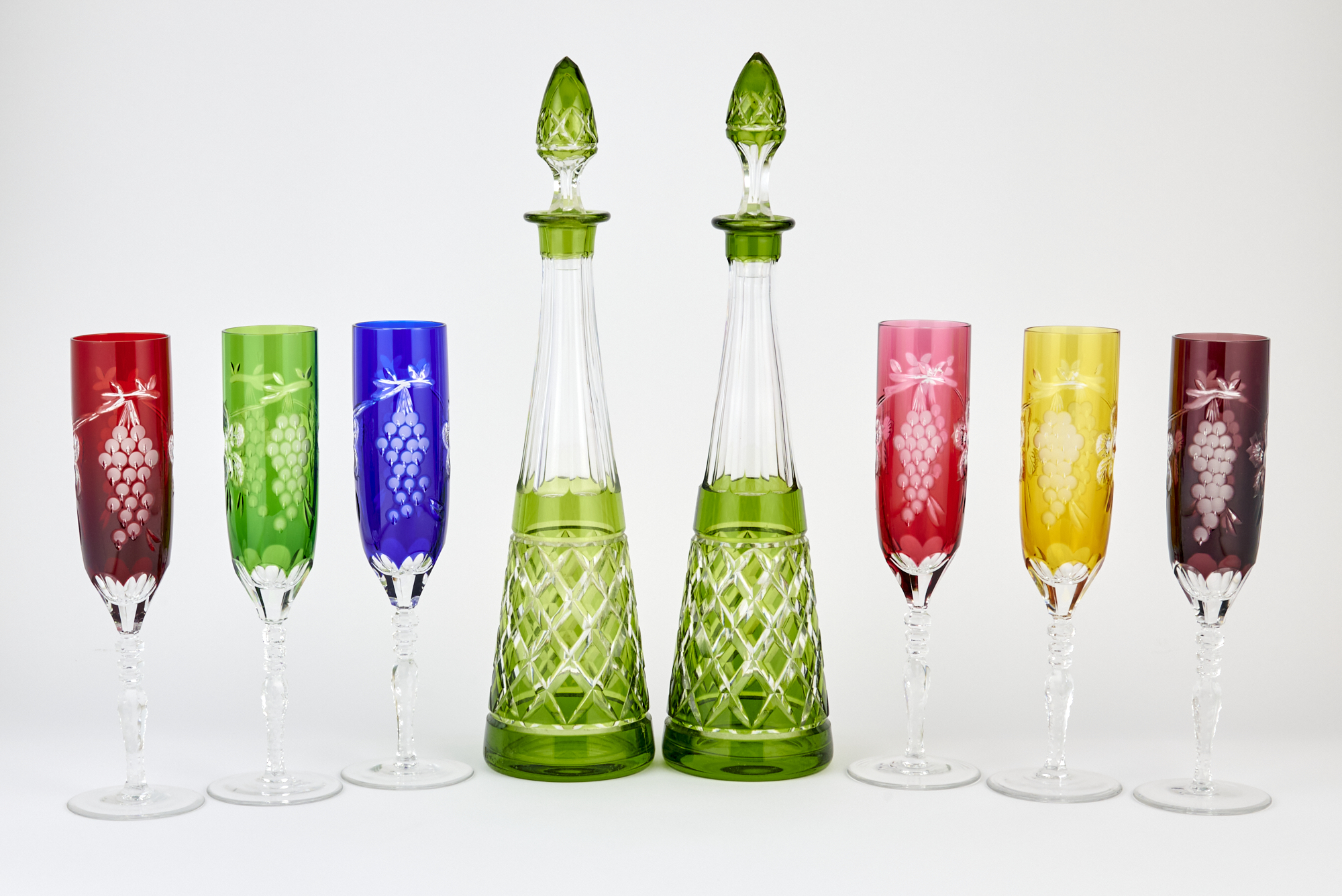 Lot image - Six Multicolored Cut to Clear Champagne Flutes