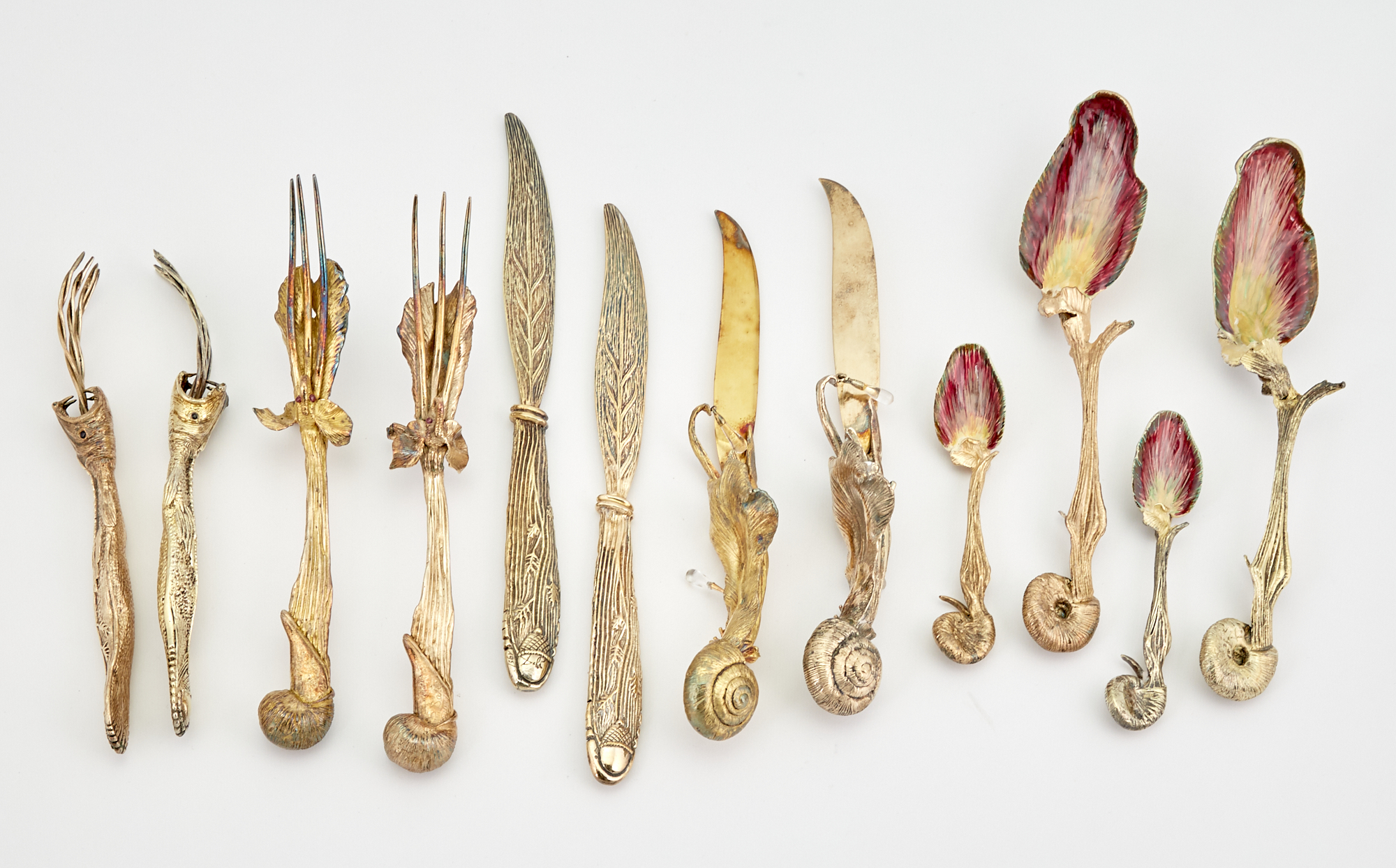 Lot image - Two After Salvador Dali Silver Gilt and Enamel Ménagère Mollusc