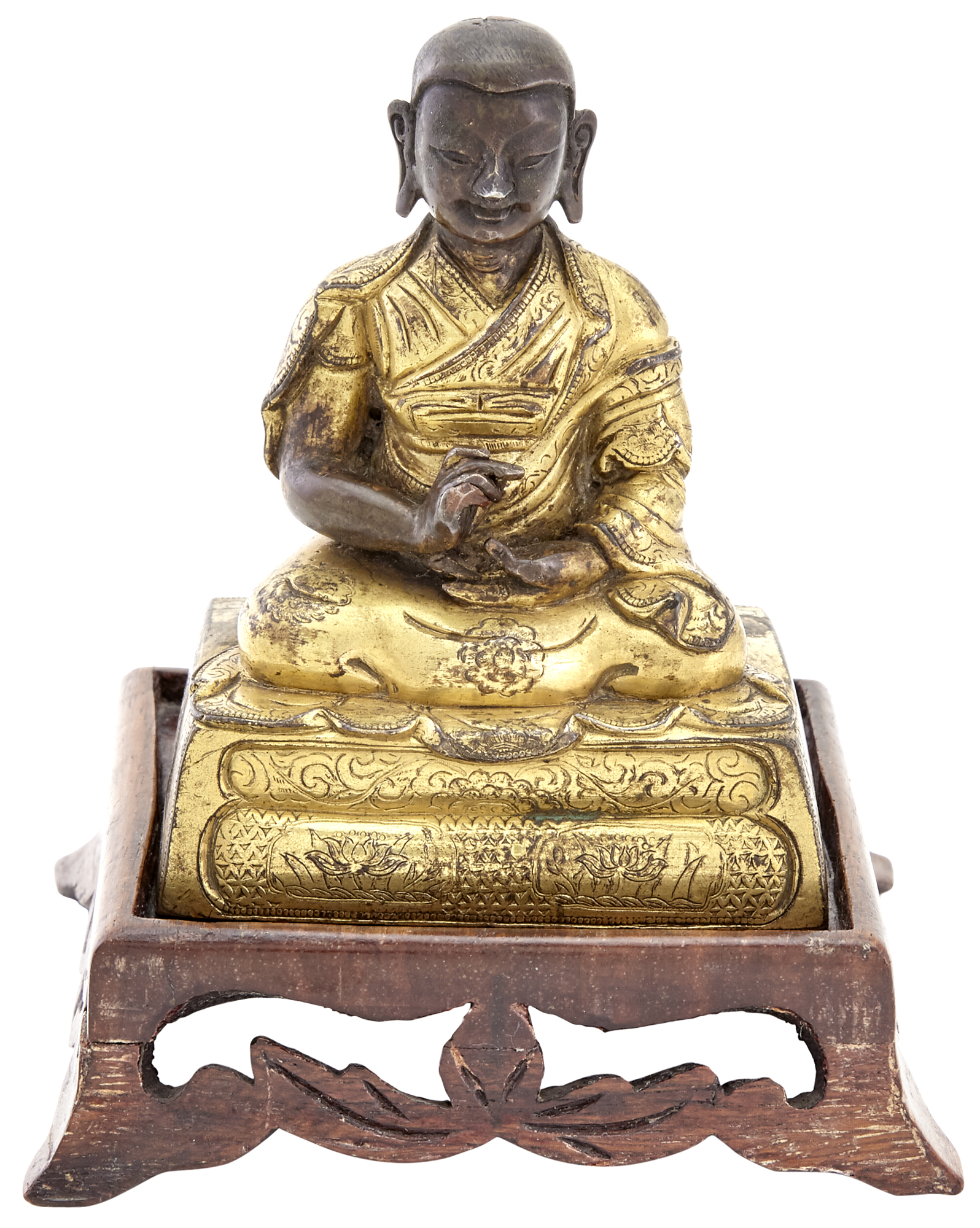 Lot image - A Tibeto-Chinese Gilt Bronze Figure of an Arhat