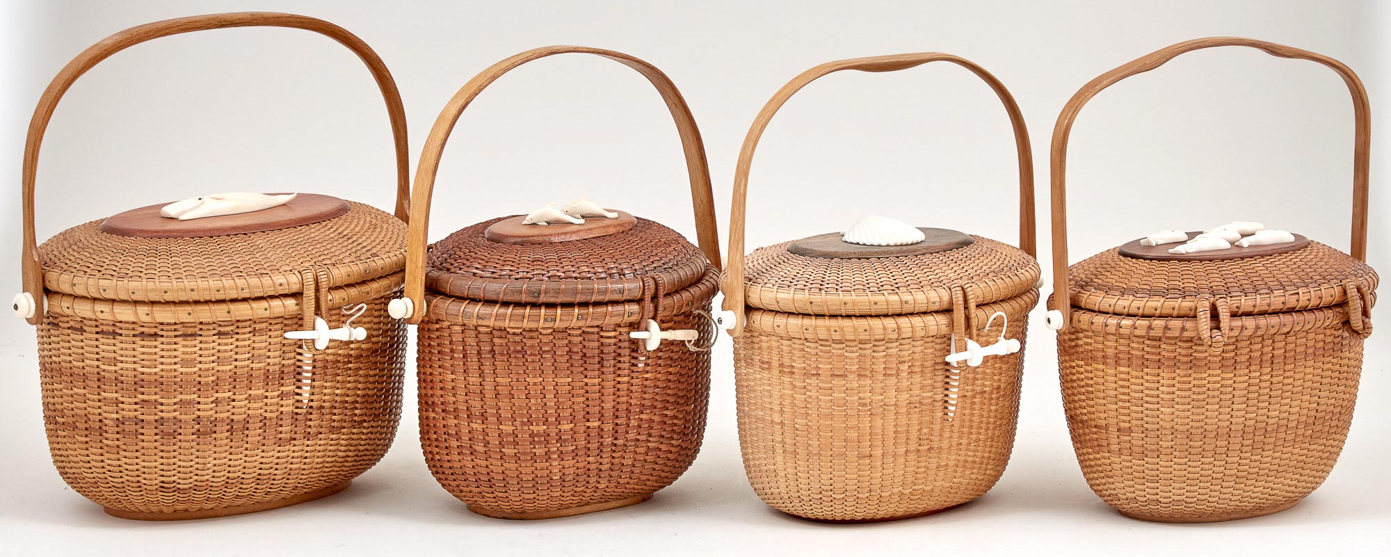 Lot image - Group of Four Lidded Lightship Basket Purses