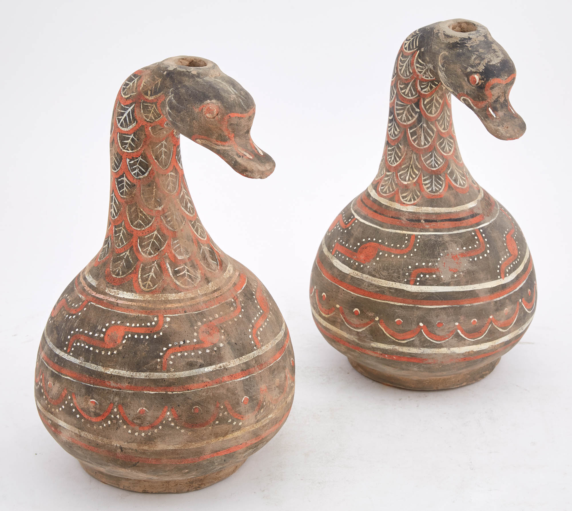 Lot image - Two Similar Chinese Duck-Headed Painted Pottery Ewers