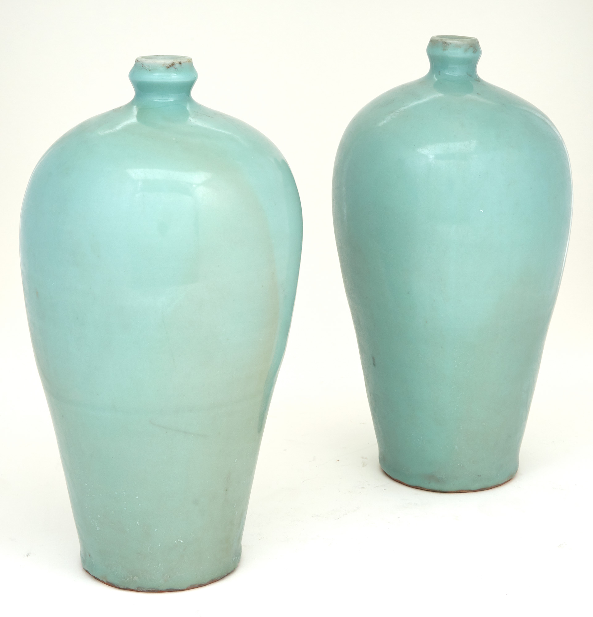 Lot image - Two Similar Chinese Celadon Ground Porcelain Vases