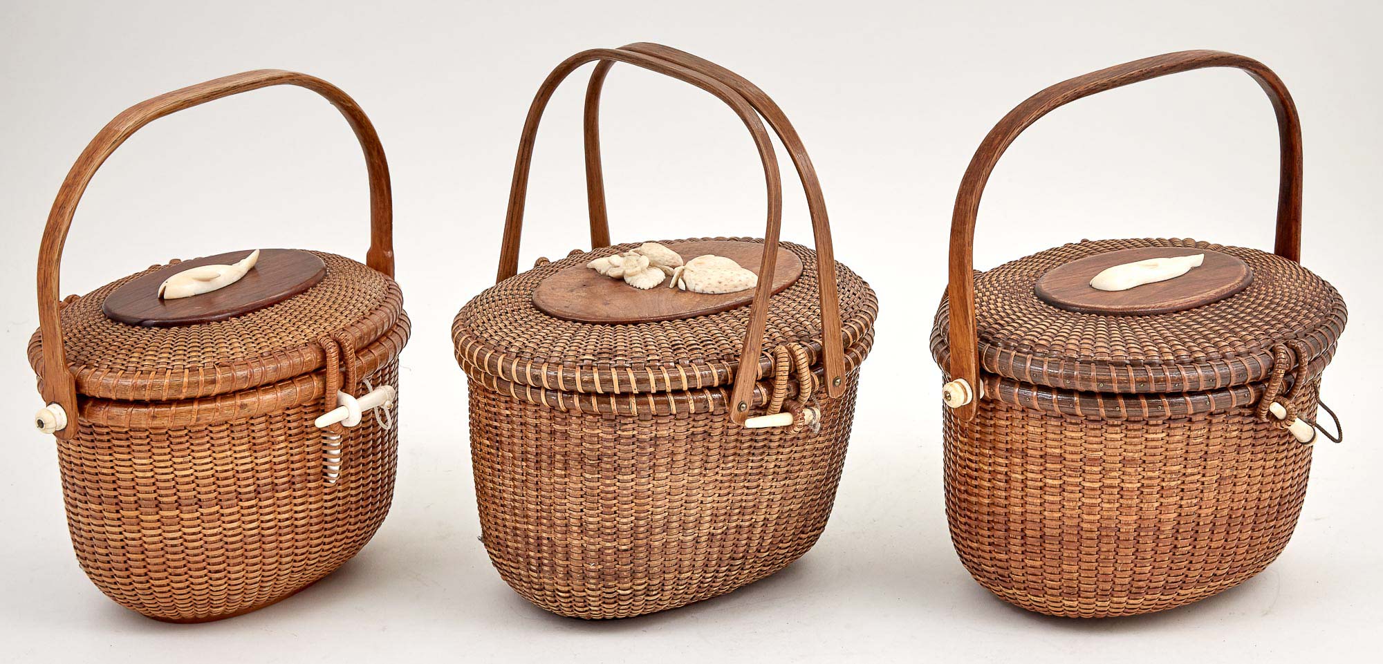 Lot image - Group of Three Lidded Lightship Basket Purses