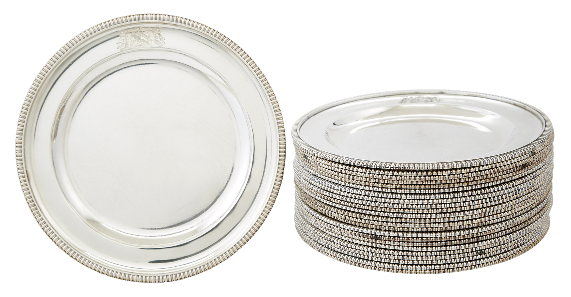 Lot image - Set of Twenty-Four George III Sterling Silver Dinner Plates