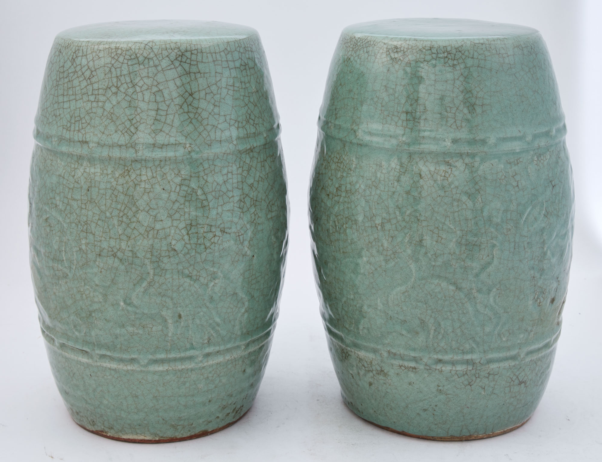 Lot image - Two Chinese Celadon Glazed Porcelain Barrel-Form Stools