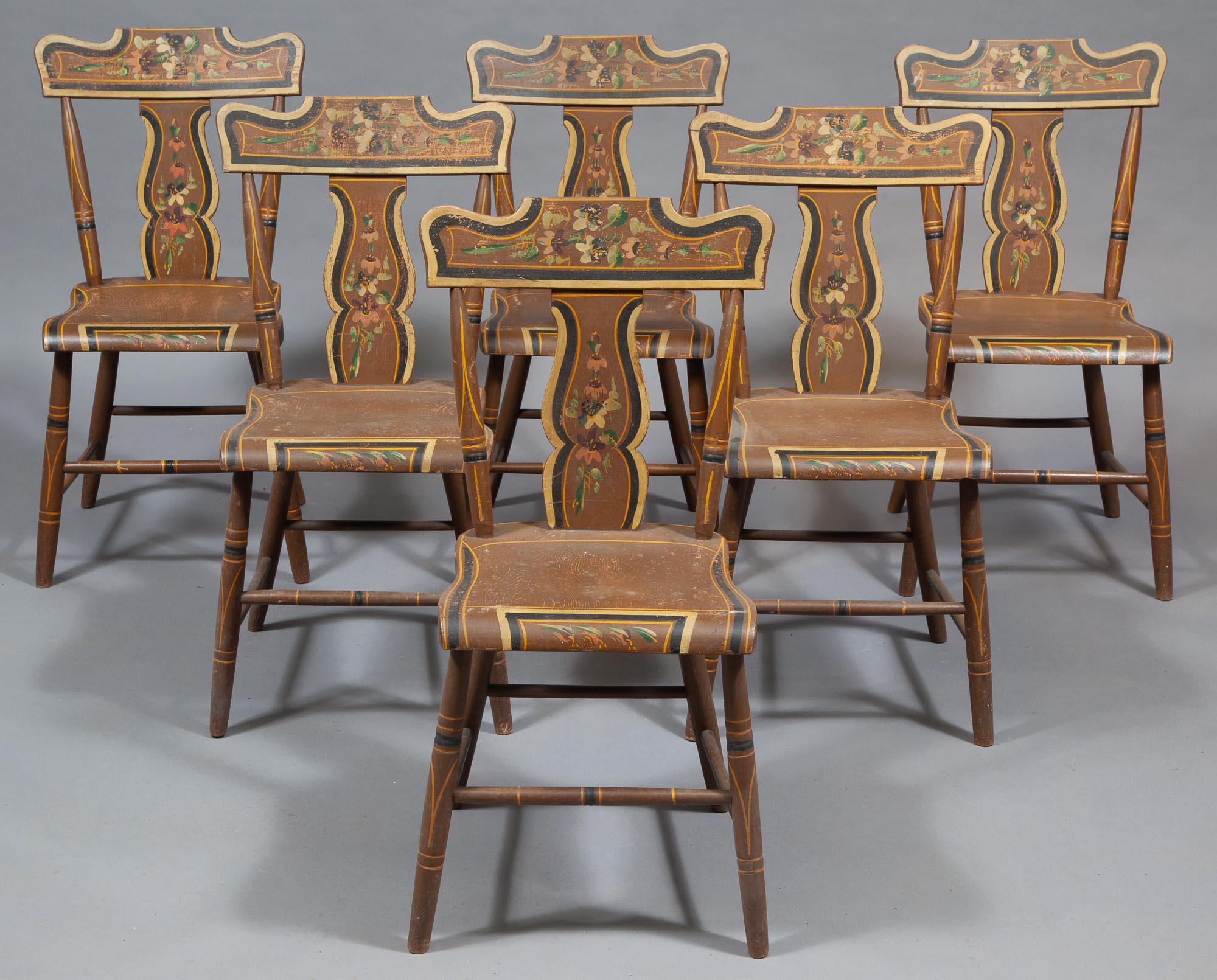Lot image - Set of Six Brown Painted and Decorated Plank Seat Side Chairs