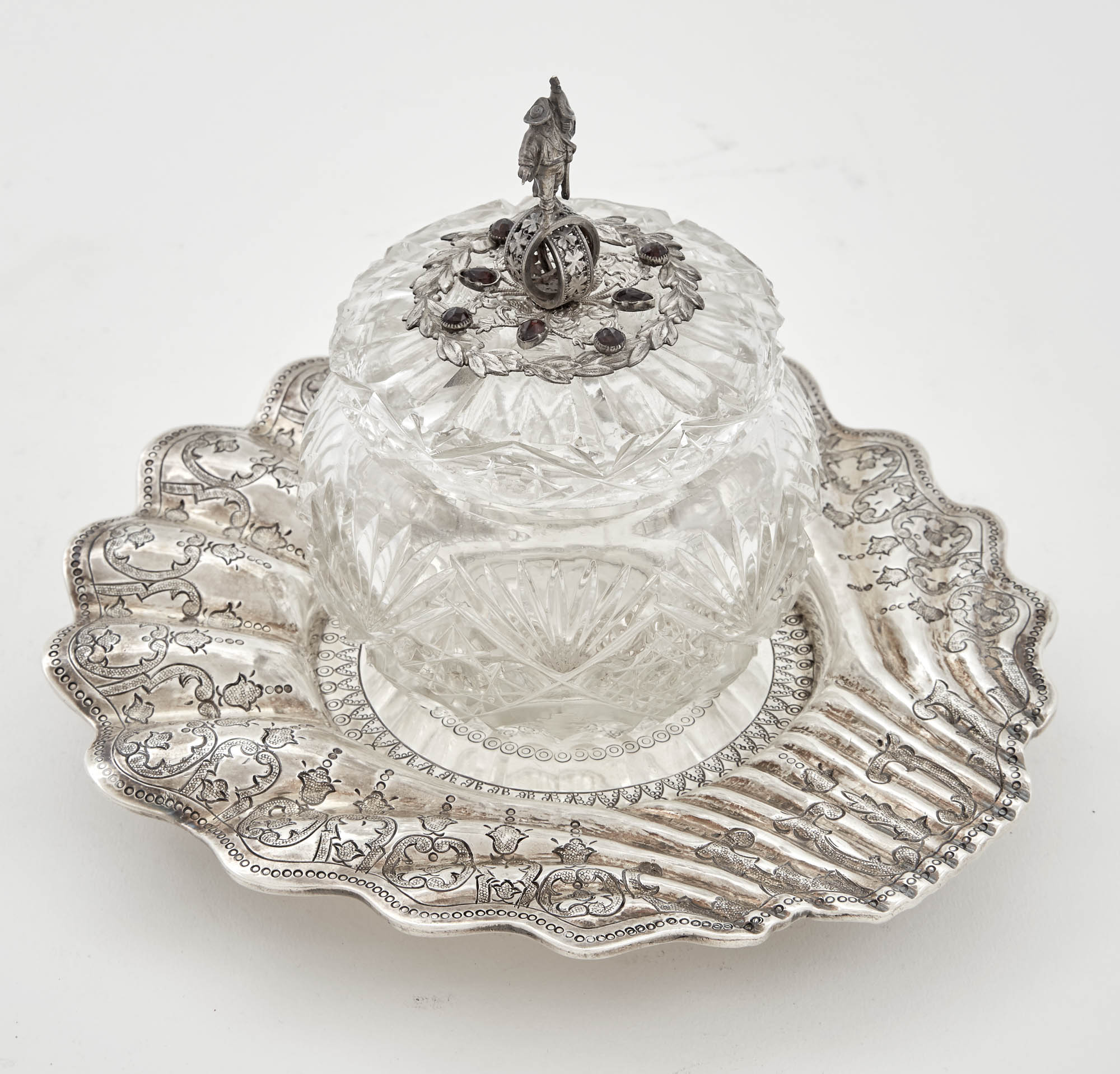 Lot image - Pewter and Garnet-Mounted Cut Glass Covered Jar; Together with a Mexican Silver Scalloped Dish