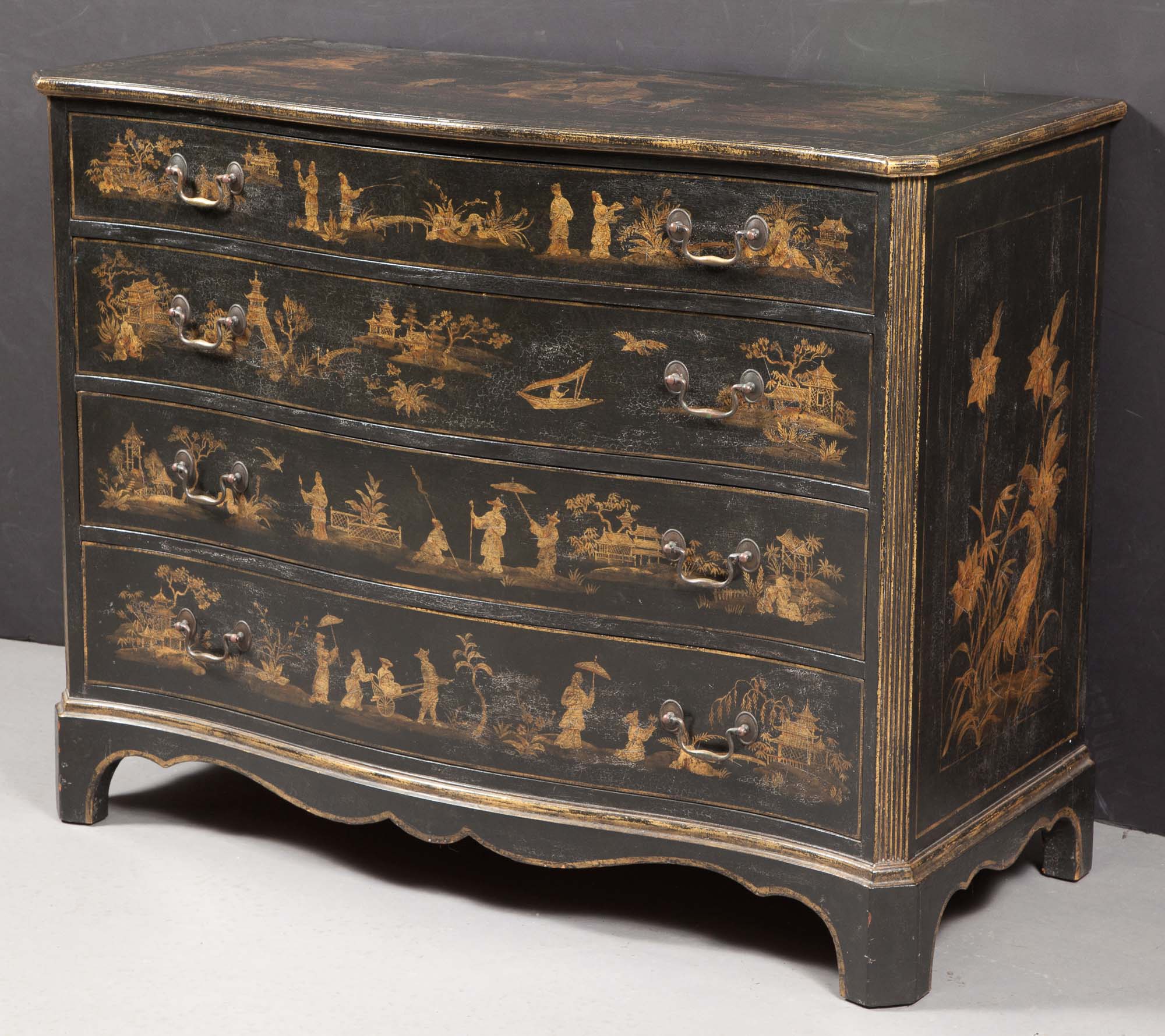 Lot image - George III Style Chinoiserie-Decorated Japanned and Parcel-Gilt Serpentine Chest of Drawers