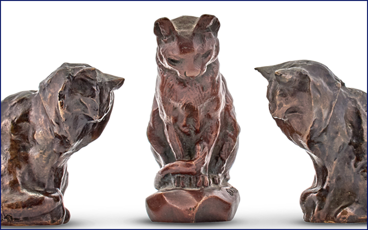Group of Three Continental Patinated Bronze Miniature Figures of Seated Cats 