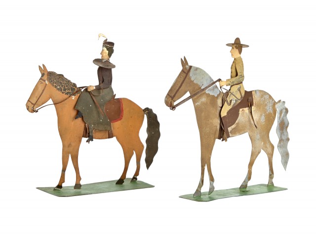 Male and Female Riders on Flat Tin Toy