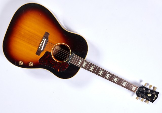 [THE BEATLES]  Replica Gibson electric-acoustic guitar of that played by the Beatles.