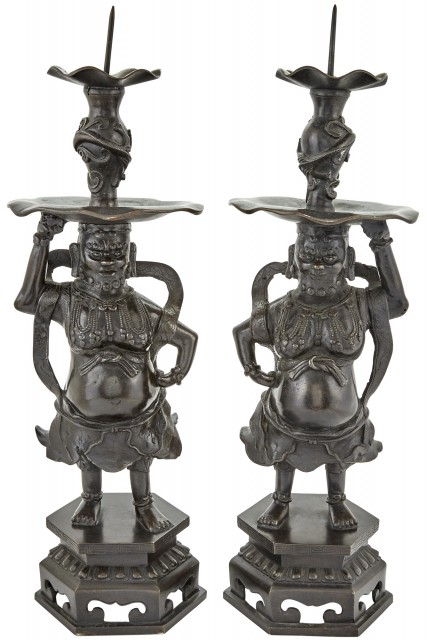 A Pair of Chinese Bronze "Foreigner" Prickets Candlesticks