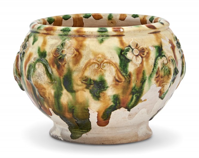 A Chinese Molded Sancai Pottery Jar with Florets
