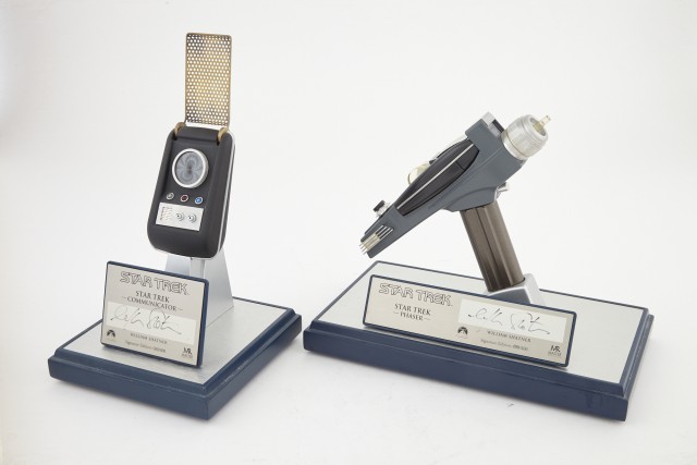[STAR TREK]  Limited edition replica Phaser and Communicator, both with plaques signed by William Shatner.