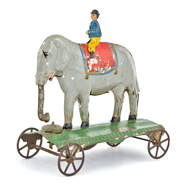 Elephant and Trainer Tin Bell Toy