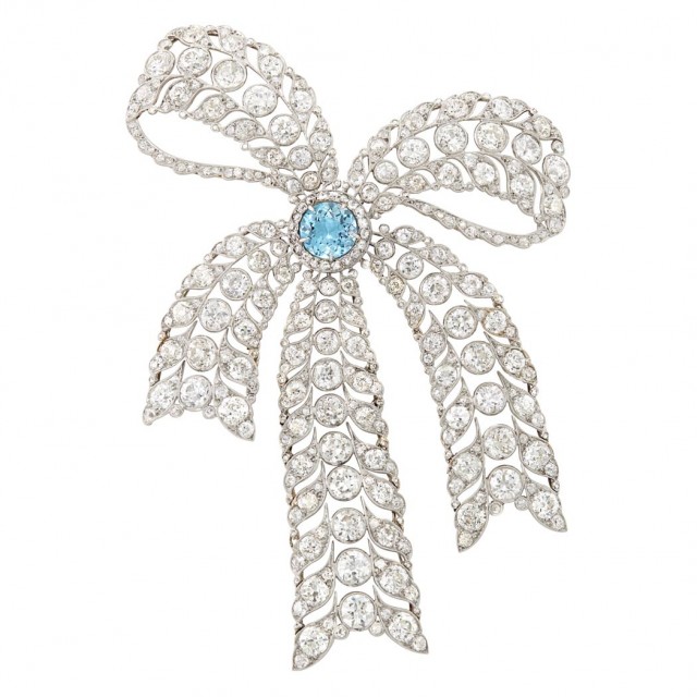 Belle Epoque Platinum, Gold, Aquamarine and Diamond Bow Brooch. Sold for $31,250.