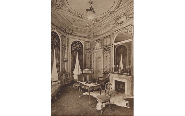 The Parlor of the State Suite in the Hotel Manhattan, with a Tiffany Studios Moorish style lamp on the center table, circa 1917.