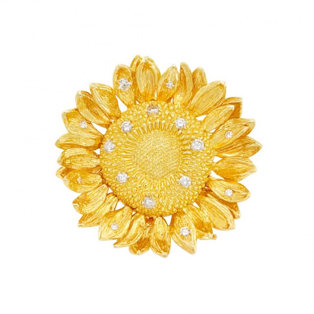 Lot 475. Gold and Diamond Sunflower Pendant-Brooch, Asprey. Est. $800-1,200
