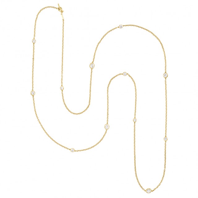 Lot 541. Long Gold and Diamond 'Diamonds by the Yard' Chain Necklace, Tiffany and Co., Elsa Peretti. Est. $6,000-8,000