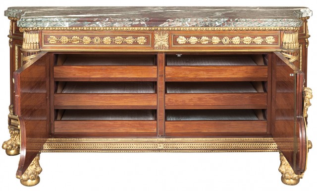 Louis XVI Style Gilt-Bronze Mounted Mahogany, Kingwood and Rosewood Marble Top Commode à Vantaux, After a model by Guillaume Benneman and Joseph Stöckel, late 19th/early 20th century. Lot 447.