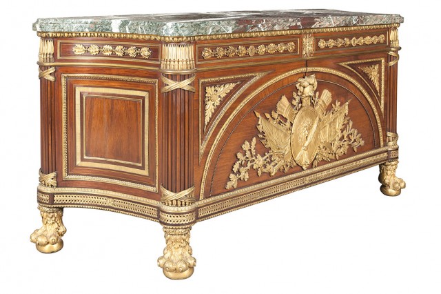 Louis XVI Style Gilt-Bronze Mounted Mahogany, Kingwood and Rosewood Marble Top Commode à Vantaux, After a model by Guillaume Benneman and Joseph Stöckel, late 19th/early 20th century. Lot 447.