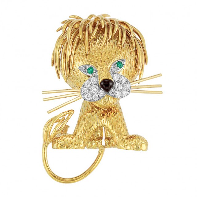 Gold, Platinum, Diamond, Emerald and Black Enamel Lion Clip-Brooch, Van Cleef and Arpels, France. Sold for $4,375. 