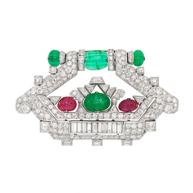 Art Deco Platinum, Diamond, Carved Emerald and Ruby Bead and Diamond 'Tutti Frutti' Brooch, Mauboussin, France, circa 1925. Sold for $22,500.