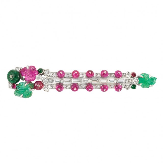 Art Deco Platinum, Diamond, Carved Emerald and Ruby and Ruby Bead 'Tutti Frutti' Barrette, by Cartier, circa 1925. Lot No. 425. Sold for $59,375.