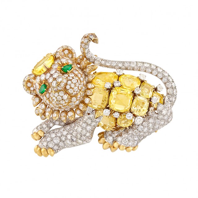 Gold, Platinum, Yellow Sapphire, Diamond and Emerald Lion Clip-Brooch, David Webb. Est. $30,000-50,000. Sold for $56,250.