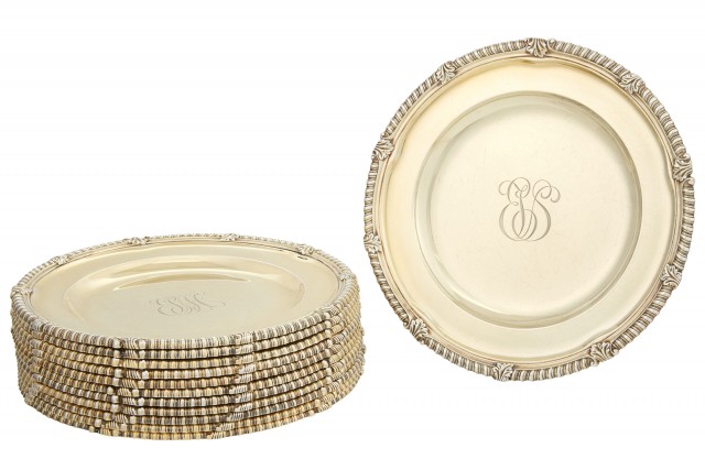 Set of Twelve Tiffany and Co. Sterling Silver Gilt Dinner Plates. Lot 253. Est. $5,000-7,000. Auction May 23.  