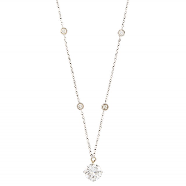 Lot 2001. White Gold and Diamond Pendant-Necklace, Round diamond ap. 1.54 cts, D color, VVS2 clarity. Est. $7,000-9,000.    
