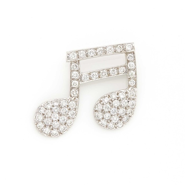 Lot 2010. White Gold and Diamond Music Note Brooch. Est. $1,200-1,800.