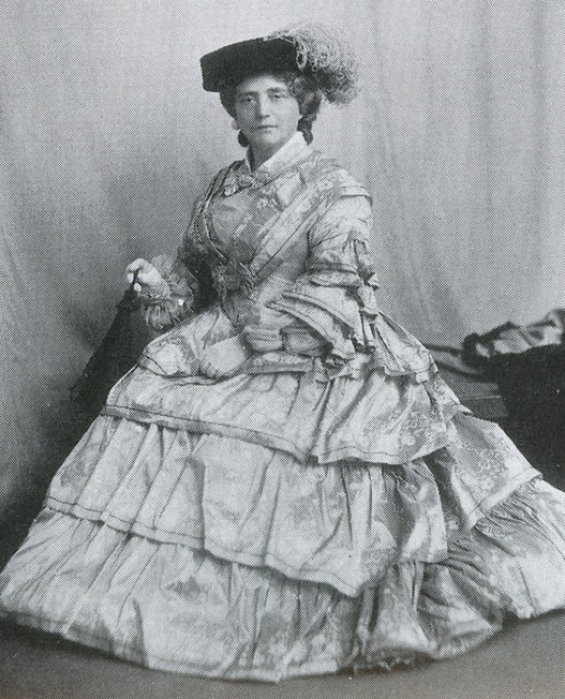 Miss Kate Cranston, circa 1903, dressed in the fashion of the 1850s.