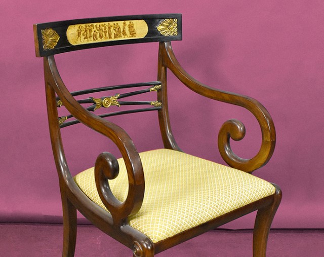 One of a set of three regency style mahogany chairs