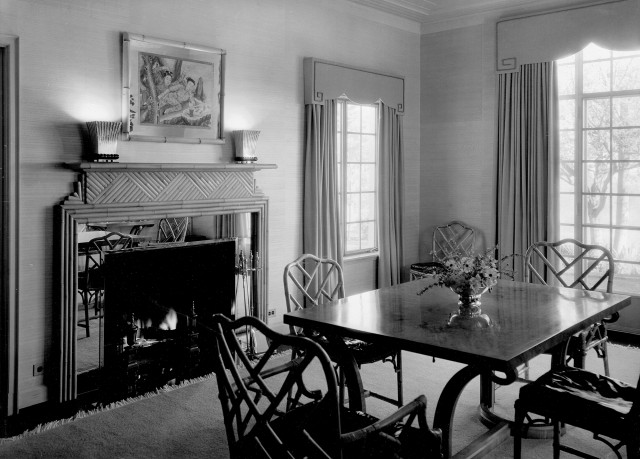 Dining room of the Cooper’s Brentwood residence, featuring the Chippendale-style bamboo chairs and mirror-backed Chinese school paintings. Auction April 14. Image courtesy Maria Cooper Janis
