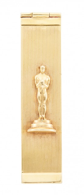 A gold Oscar form lipstick holder presented to Celeste Holm by Truth or Consequences host Ralph Edwards. Circa early 1948. Est. $500-700. Lot 31. Auction April 28.