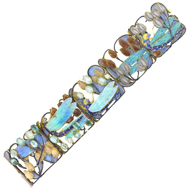 René Lalique Gold, Carved Opal, Enamel and Aquamarine Dragonfly Bracelet, circa 1902. Lot 201. Auction October 21.